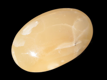 Honey Calcite palm stone 58-62mm 83-95g Rocks and Things