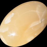 Honey Calcite palm stone 58-62mm 83-95g Rocks and Things