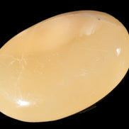 Honey Calcite palm stone 58-62mm 83-95g Rocks and Things