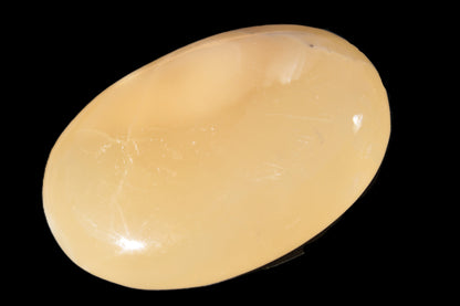 Honey Calcite palm stone 58-62mm 83-95g Rocks and Things