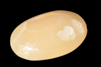 Honey Calcite palm stone 58-62mm 83-95g Rocks and Things