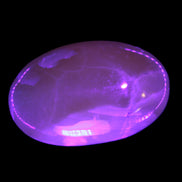 Honey Calcite palm stone 58-62mm 83-95g in UV light - Rocks and Things Store