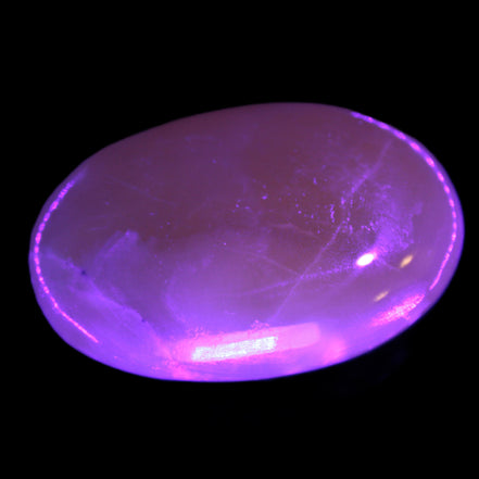Honey Calcite palm stone 58-62mm 83-95g in UV light - Rocks and Things Store