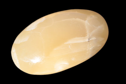 Honey Calcite palm stone 58-62mm 83-95g Rocks and Things