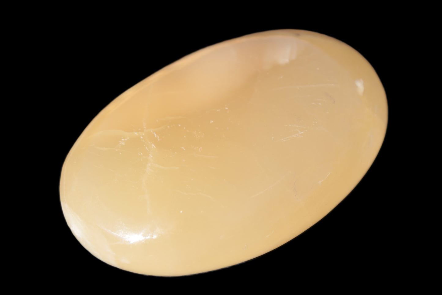 Honey Calcite palm stone 58-62mm 83-95g Rocks and Things