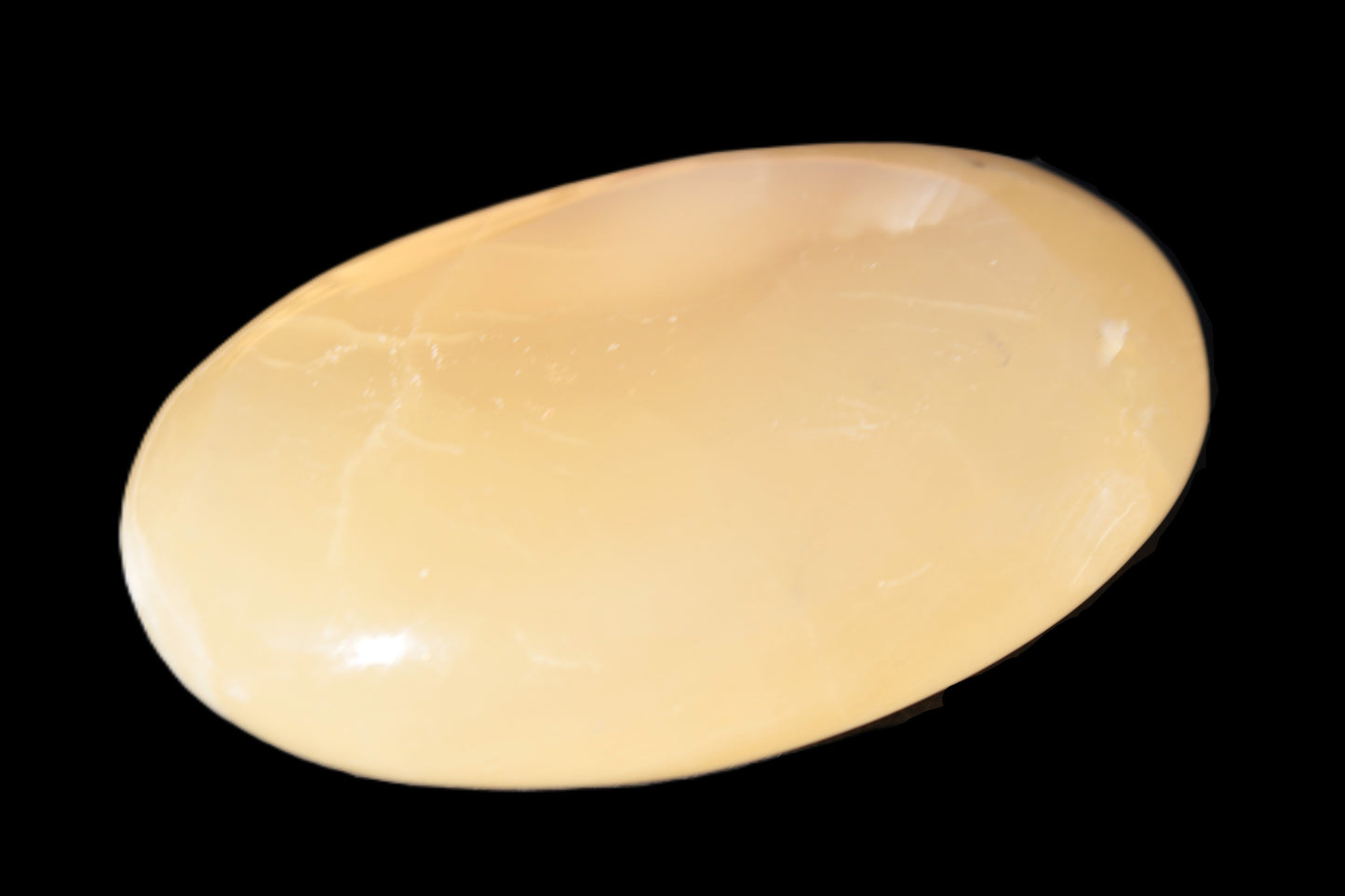 Honey Calcite palm stone 58-62mm 83-95g Rocks and Things