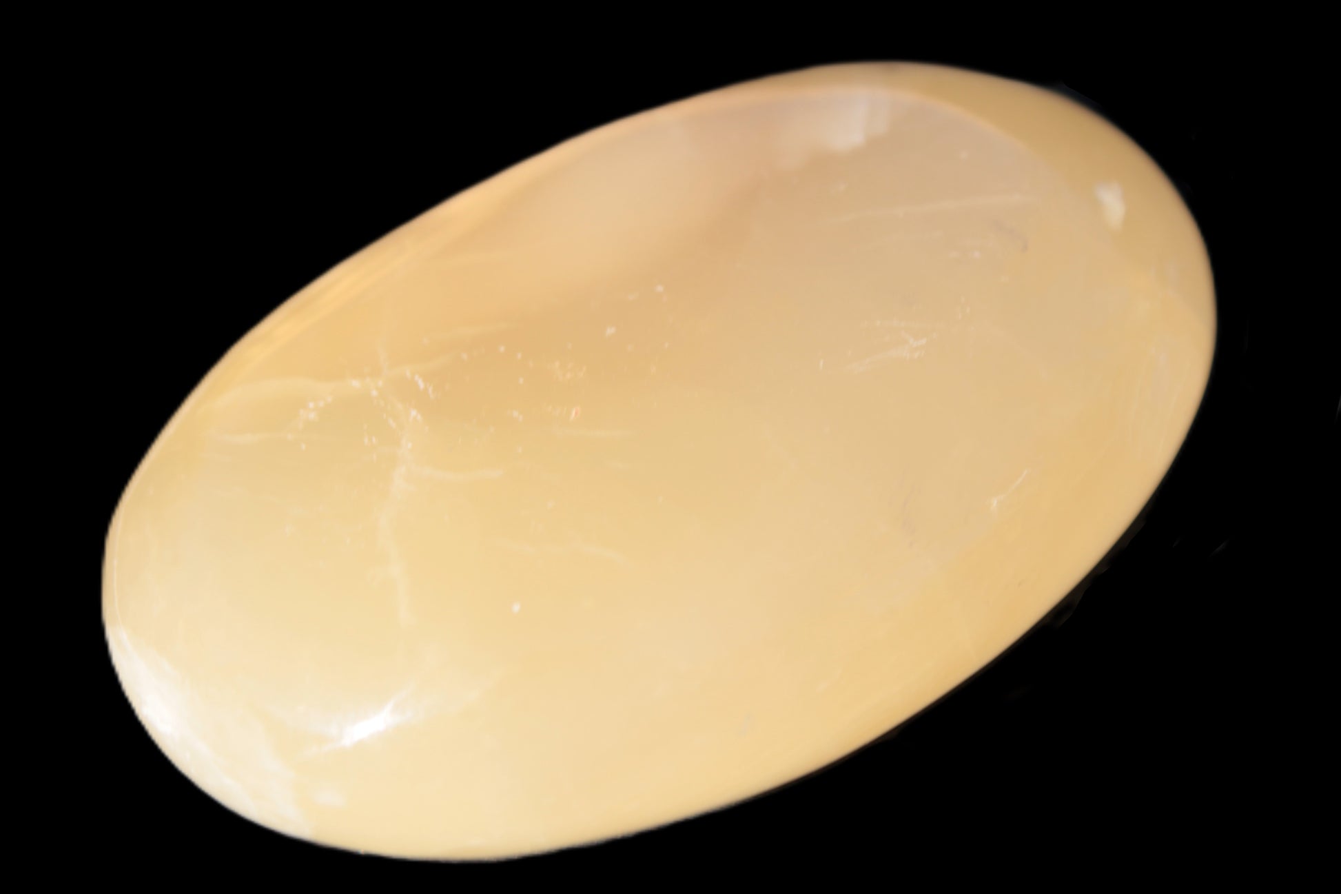 Honey Calcite palm stone 58-62mm 83-95g Rocks and Things