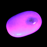 White Jade palm stone from Pakistan 62-72mm 63-86.7g in UV light