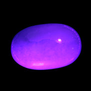 White Jade palm stone from Pakistan 62-72mm 63-86.7g in UV light