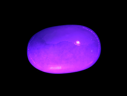 White Jade palm stone from Pakistan 62-72mm 63-86.7g in UV light