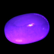 White Jade palm stone from Pakistan 62-72mm 63-86.7g in UV light