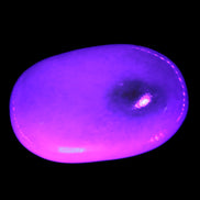 White Jade palm stone from Pakistan 62-72mm 63-86.7g in UV light