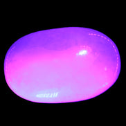 White Jade palm stone from Pakistan 62-72mm 63-86.7g in UV light