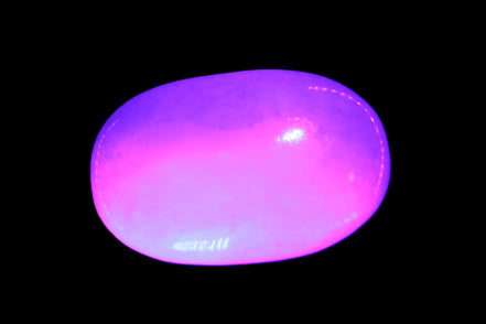 White Jade palm stone from Pakistan 62-72mm 63-86.7g in UV light