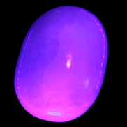 White Jade palm stone from Pakistan 62-72mm 63-86.7g in UV light