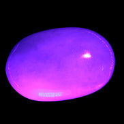 White Jade palm stone from Pakistan 62-72mm 63-86.7g in UV light - Rocks and Things Store