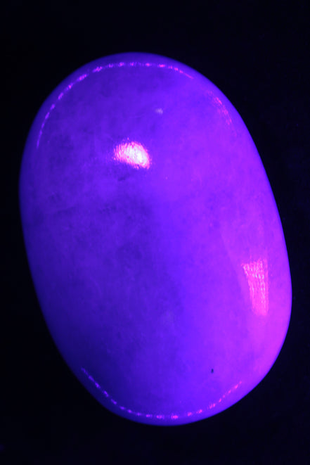 White Jade palm stone from Pakistan 62-72mm 63-86.7g in UV light - Rocks and Things Store