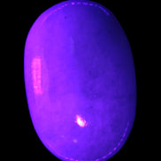 White Jade palm stone from Pakistan 62-72mm 63-86.7g in UV light - Rocks and Things Store