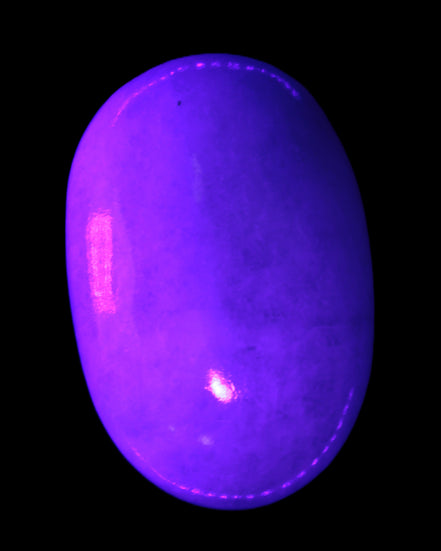 White Jade palm stone from Pakistan 62-72mm 63-86.7g in UV light - Rocks and Things Store