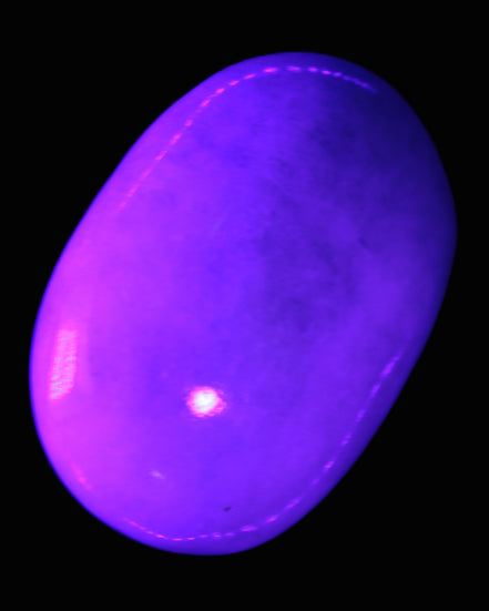 White Jade palm stone from Pakistan 62-72mm 63-86.7g in UV light - Rocks and Things Store