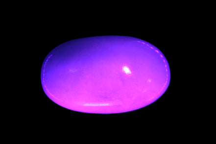 White Jade palm stone from Pakistan 62-72mm 63-86.7g in UV light