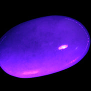 White Jade palm stone from Pakistan 62-72mm 63-86.7g in UV light