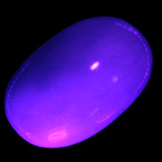 White Jade palm stone from Pakistan 62-72mm 63-86.7g in UV light