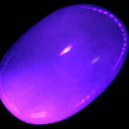 White Jade palm stone from Pakistan 62-72mm 63-86.7g in UV light