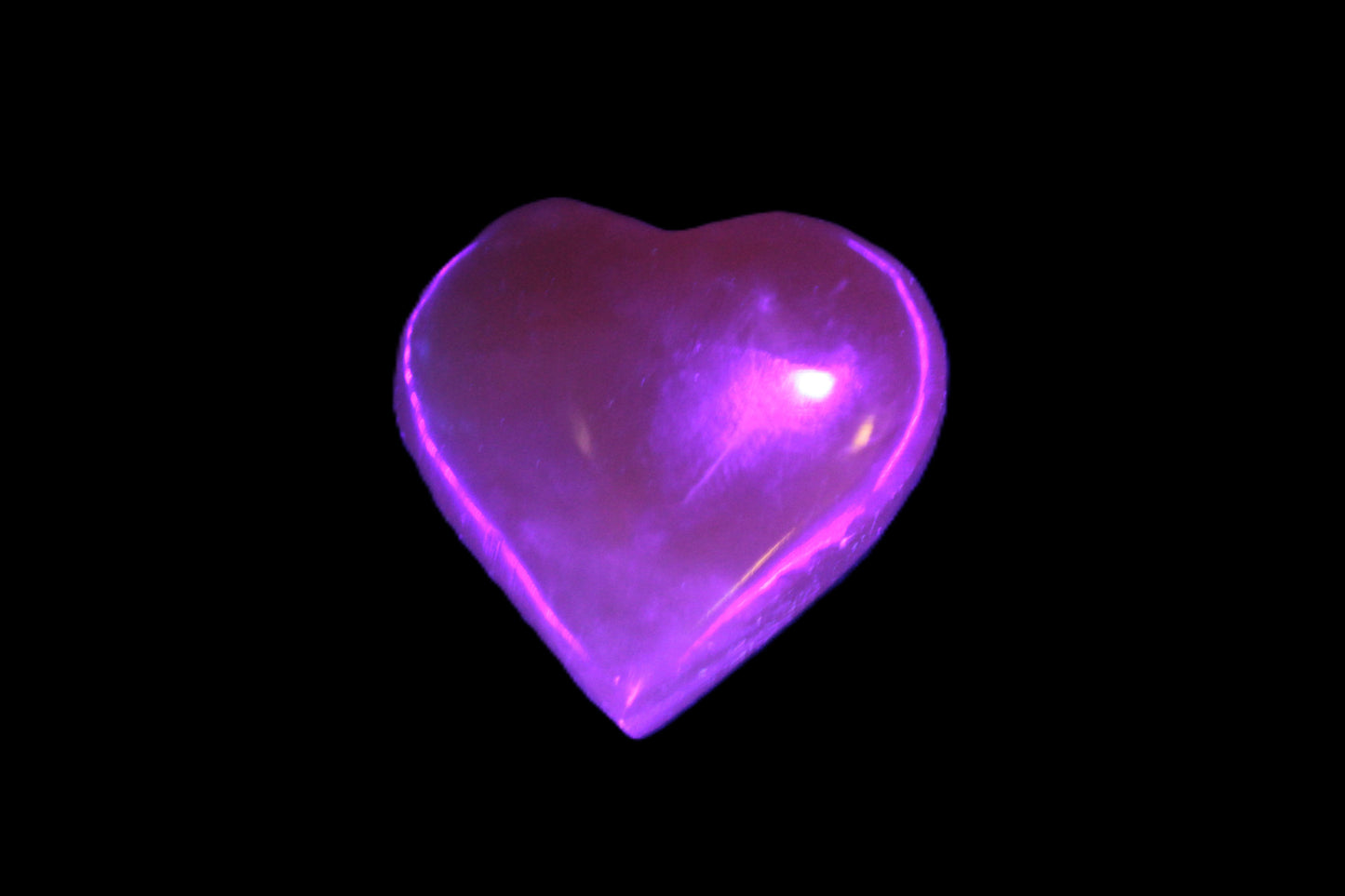 Small Honey Calcite heart 34-35g in UV light