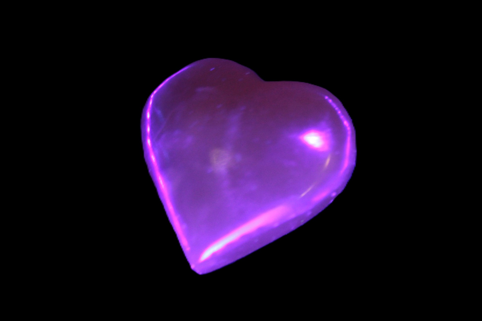 Small Honey Calcite heart 34-35g in UV light