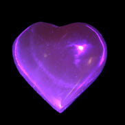 Small Honey Calcite heart 34-35g in UV light