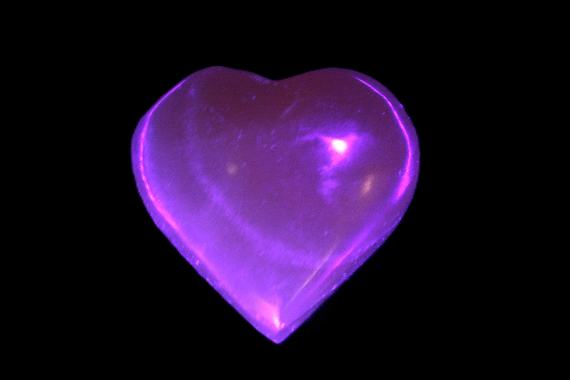 Small Honey Calcite heart 34-35g in UV light