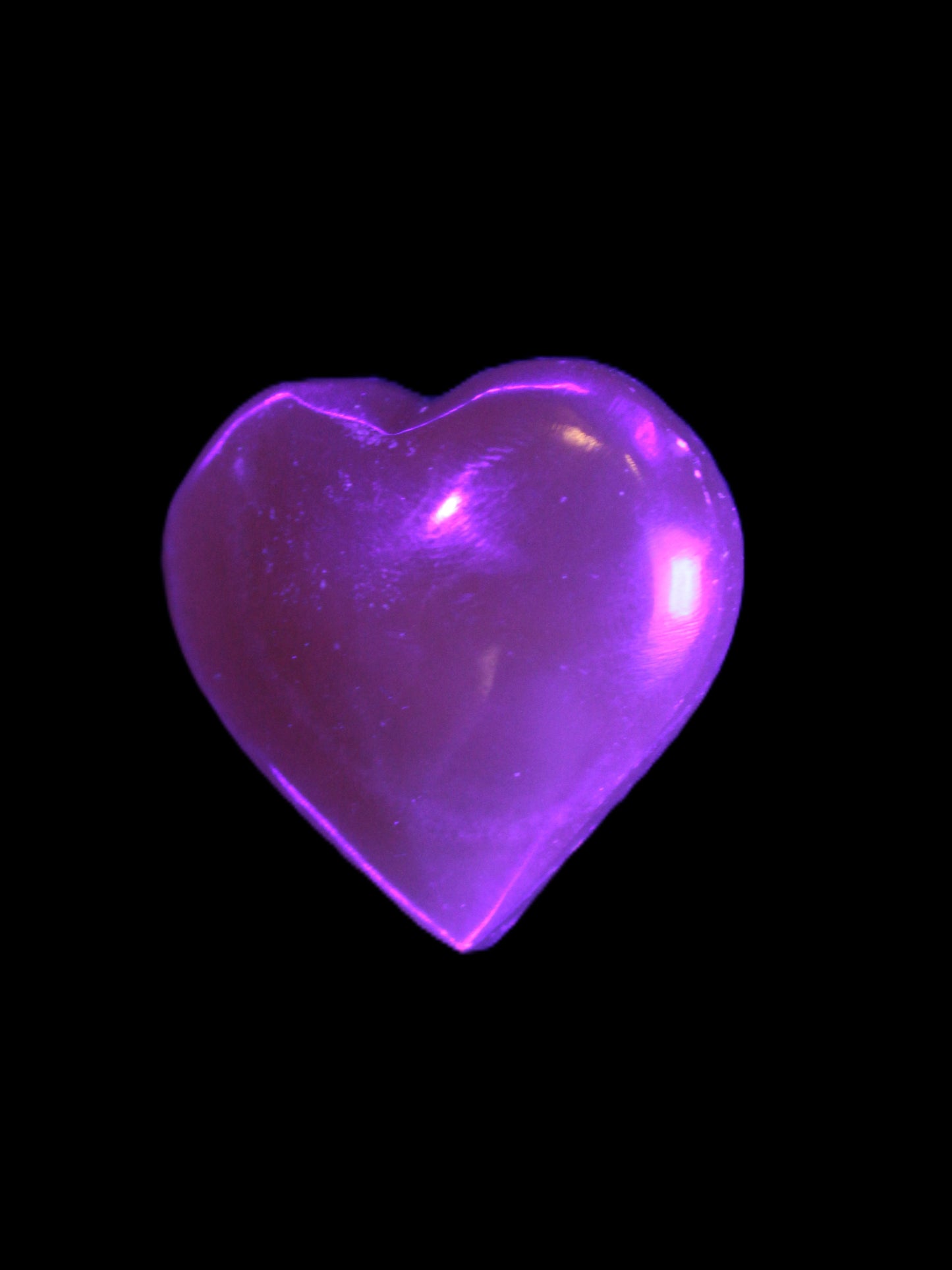 Small Honey Calcite heart 34-35g in UV light