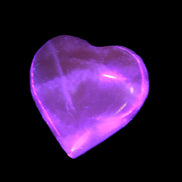 Small Honey Calcite heart 34-35g in UV light