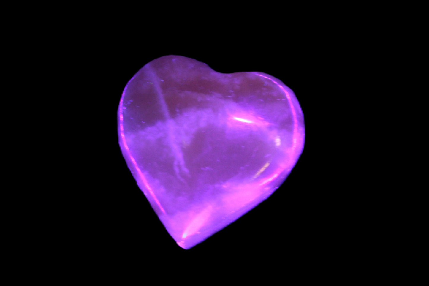 Small Honey Calcite heart 34-35g in UV light