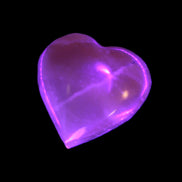 Small Honey Calcite heart 34-35g in UV light