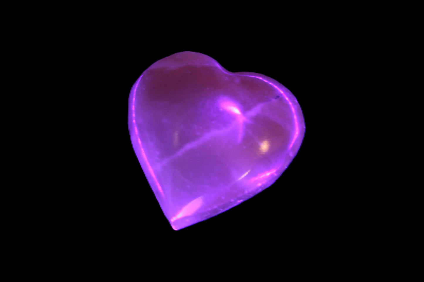 Small Honey Calcite heart 34-35g in UV light