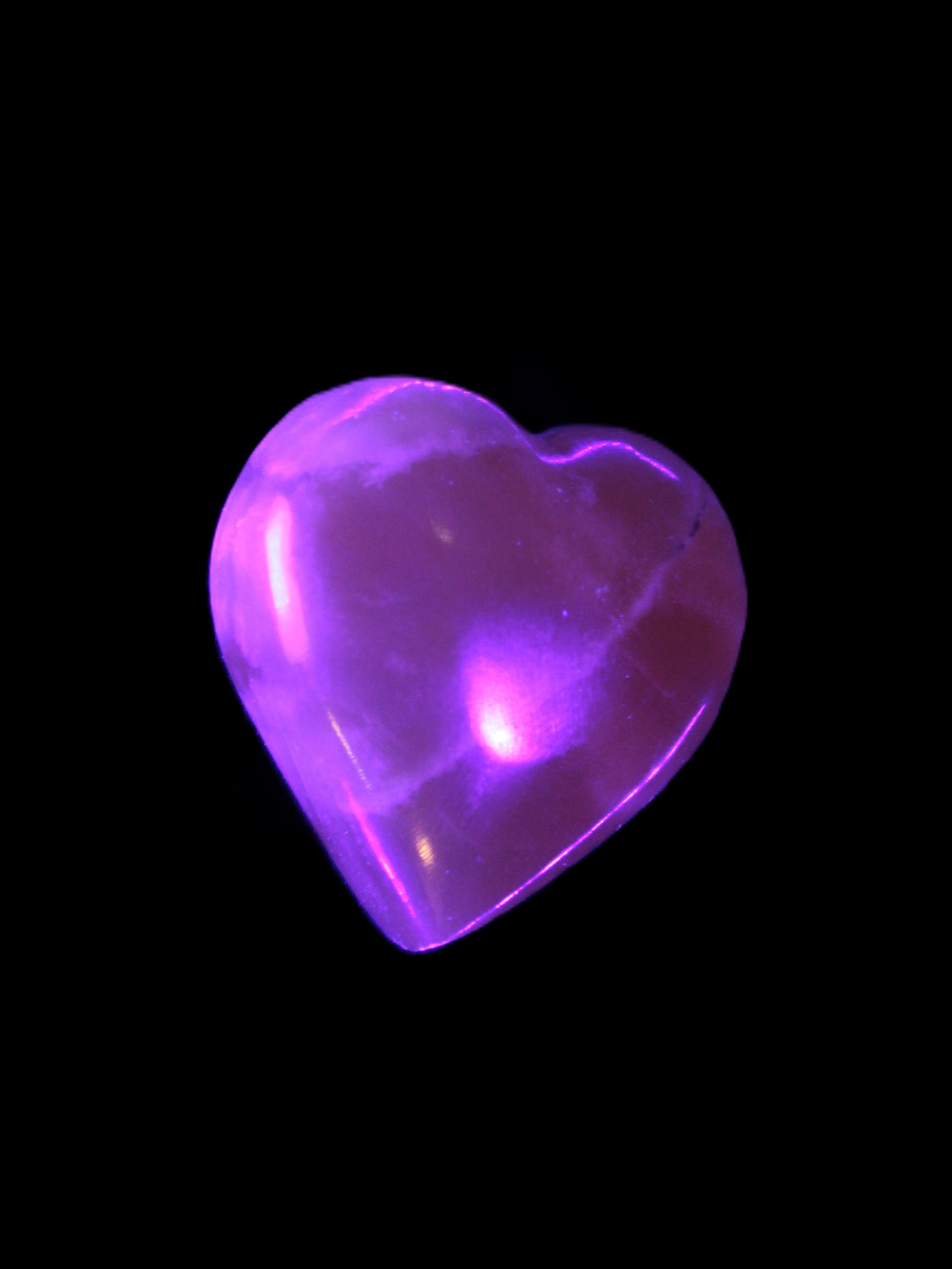 Small Honey Calcite heart 34-35g in UV light