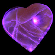 Honey Calcite heart  66-75g in UV light Rocks and Things