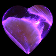 Honey Calcite heart  66-75g in UV light Rocks and Things