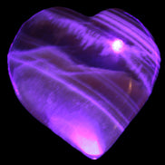 Honey Calcite heart  66-75g in UV light Rocks and Things