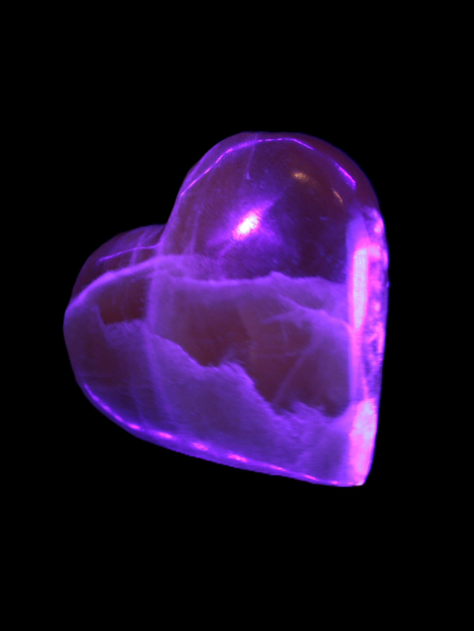 Honey Calcite heart 66-75g in UV light Rocks and Things