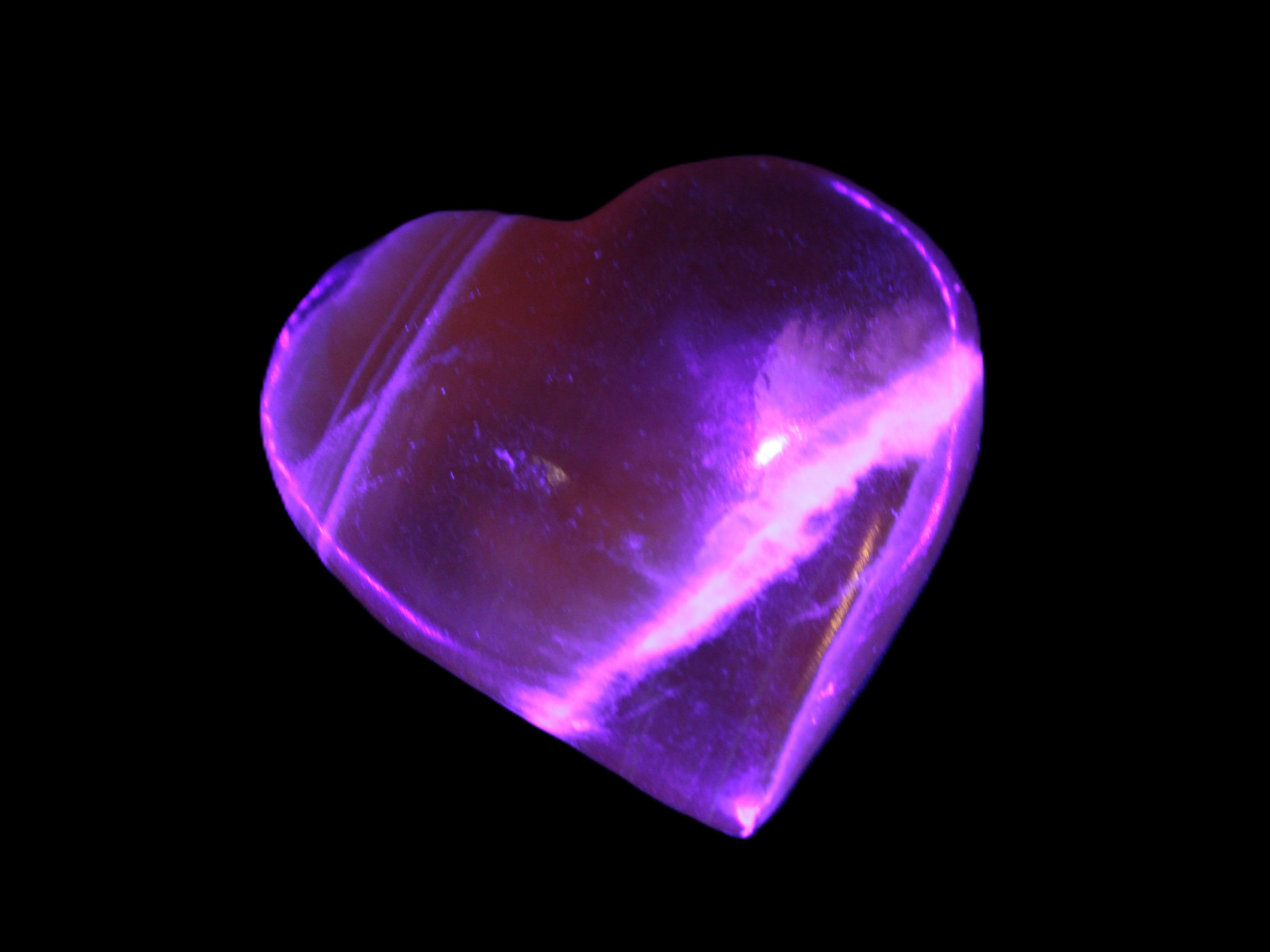 Honey Calcite heart  66-75g in UV light Rocks and Things