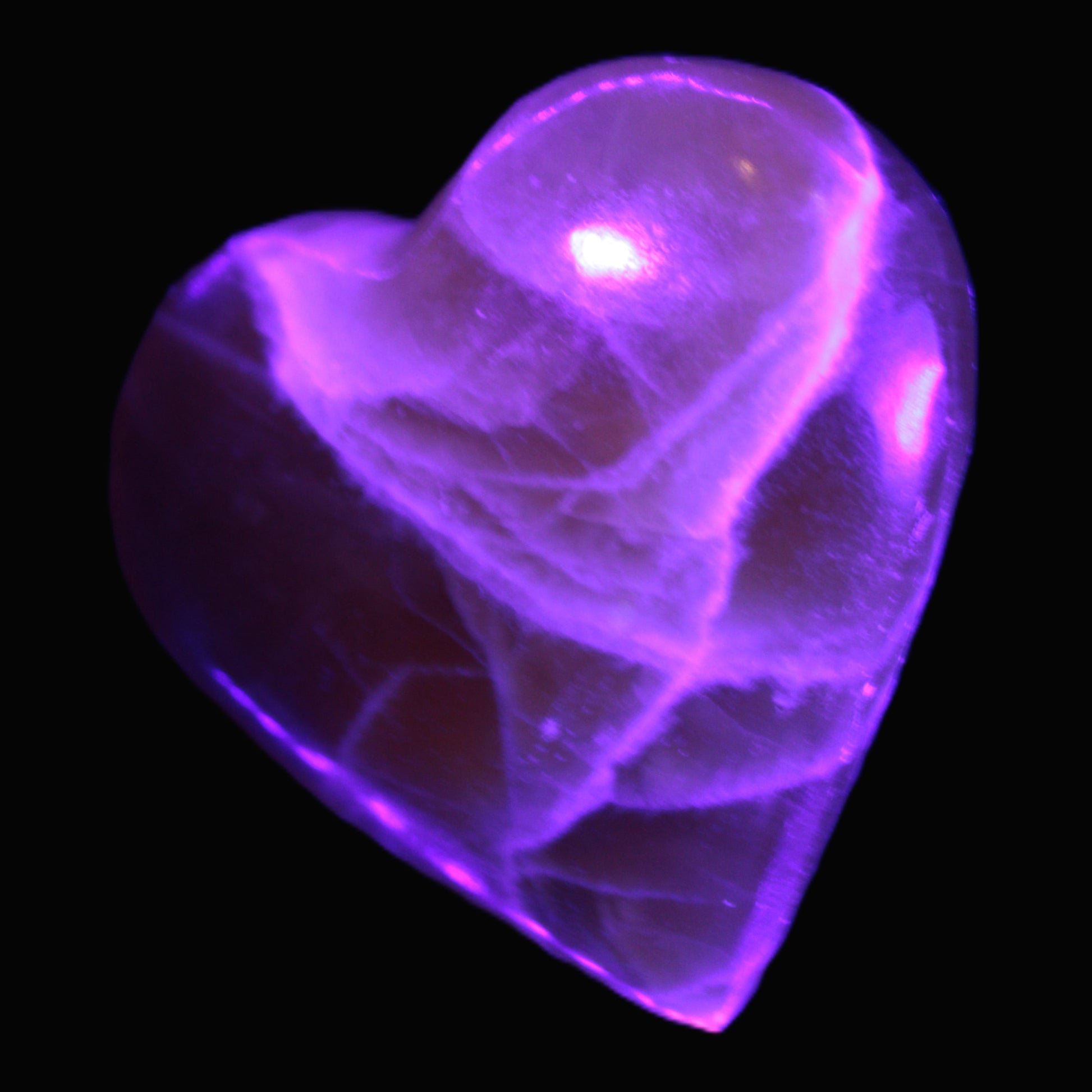 Honey Calcite heart 66-75g in UV light Rocks and Things