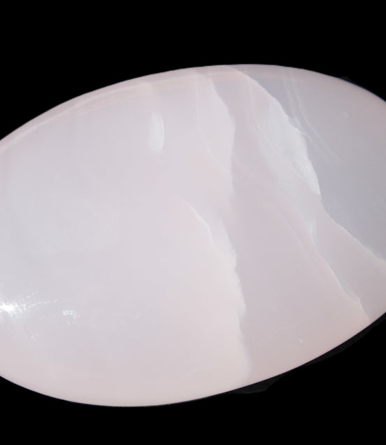 Pink Mangano Calcite palm stone 115g Rocks and Things