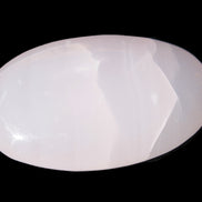 Pink Mangano Calcite palm stone 115g Rocks and Things