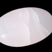 Pink Mangano Calcite palm stone 115g Rocks and Things