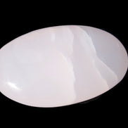 Pink Mangano Calcite palm stone 115g Rocks and Things