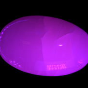 Pink Mangano Calcite palm stone 115g Rocks and Things