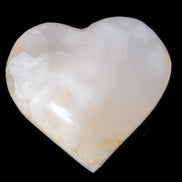 Mangano Calcite hand-carved heart 56*54*20mm 87.5g Rocks and Things